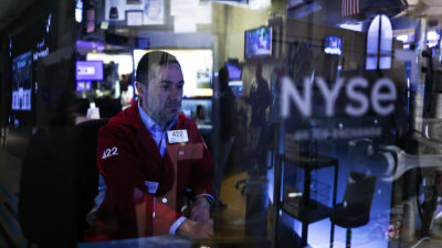 Markets opened slightly lower Tuesday as a major sell-off prompted