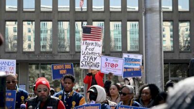 The Trump administration is moving to reinstate about 24,000 probationary