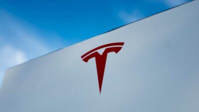 A man was arrested after driving his car into protestors