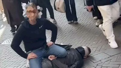 An English-speaking tourist who tackled a suspected knifeman during a